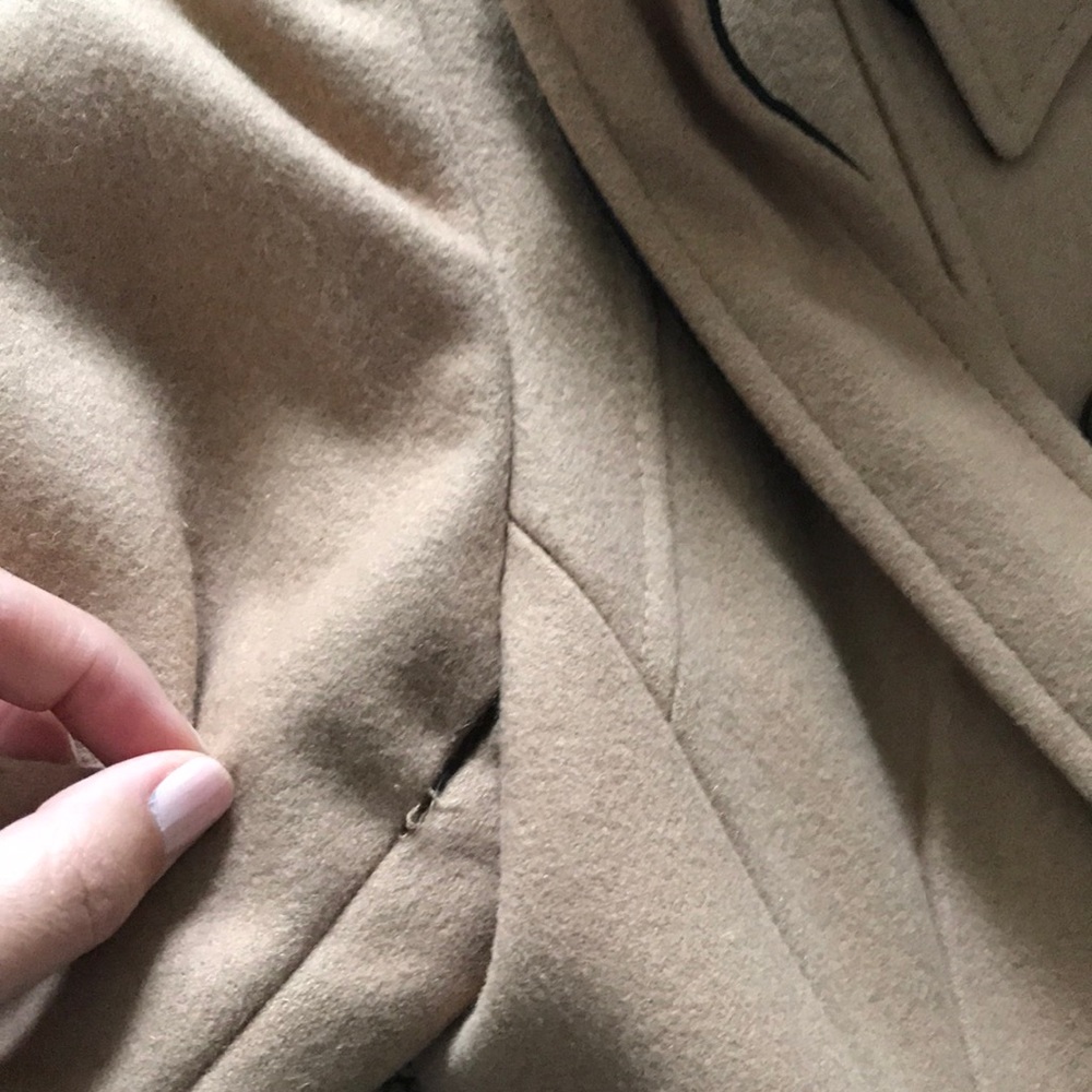 DKNY tear on coat